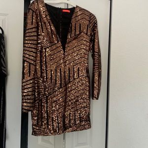 sequin mini dress with a deep V cut